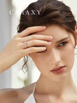 model-wearring-pink-halo-half-pave-band-ring-caraxy