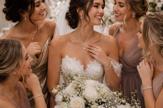 Bride and bridesmaids wearing affordable lab-grown diamond jewelry for a wedding