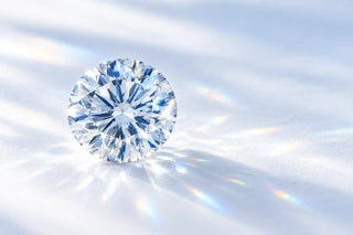 Lab-grown diamond shows blue nuance by diamond fire on table