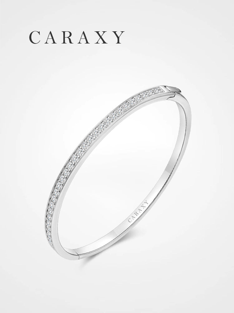 1.4 ct. tw. lab grown diamond half bangle bracelet shown in an angled product view.