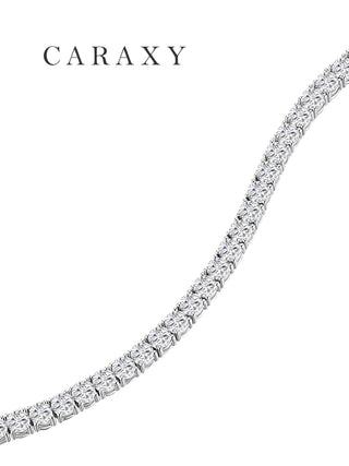 Close-up detail of a lab created diamond tennis bracelet in 18K white gold.
