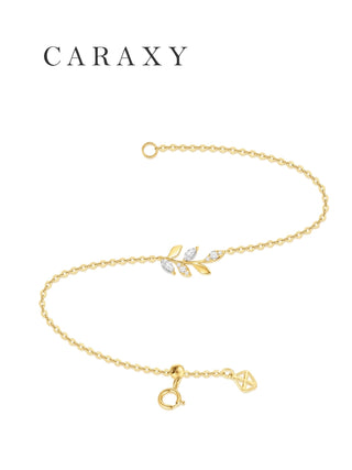 Flat view of a dainty leaf-inspired lab grown diamond bracelet in 18K yellow gold with adjustable sliding bead.