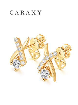 Side view of 18K yellow gold vine earrings set with round lab grown diamonds