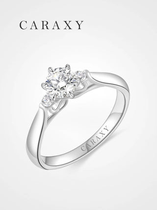 45-degree angle studio shot of the 1 carat engagement ring highlighting the sparkle and inner "CARAXY" engraving.