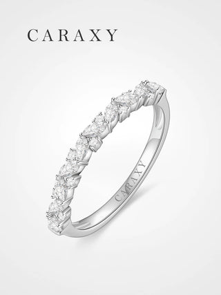 Perspective view of the Caraxy wedding ring highlighting the precision prong setting.
