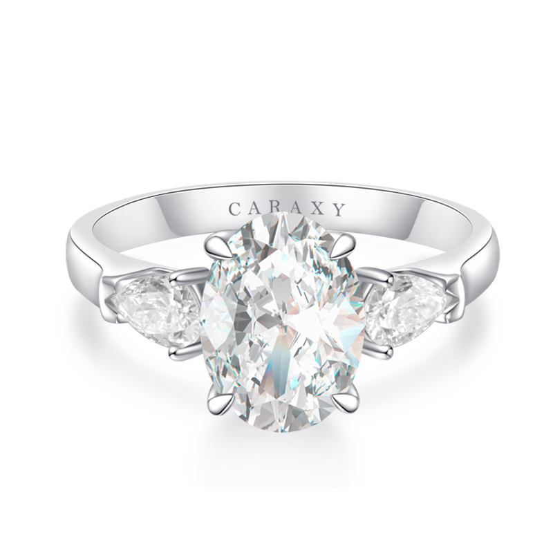 THREE-STONE RING