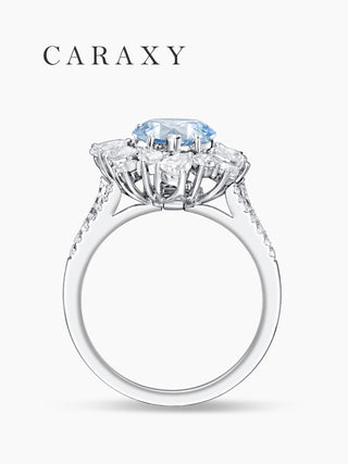 Side profile view of the fancy intense blue diamond ring showing the intricate prong setting.
