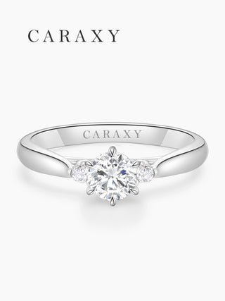 Front view of the 1 carat three stone round diamond engagement ring with a smooth 18K gold band.