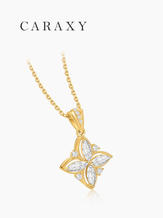 45-degree angle shot of the gold flower necklace showcasing the detailed diamond-set bale.