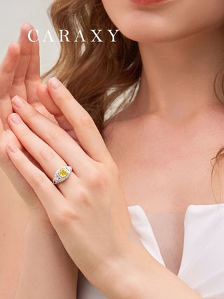 Model wearing the 1.5ct yellow diamond engagement ring showcasing its vibrant fancy intense color.