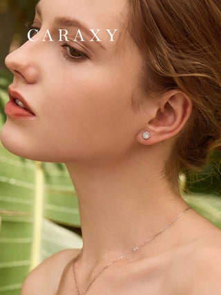 On-ear lifestyle shot of CARAXY lab-created diamond halo earrings for women