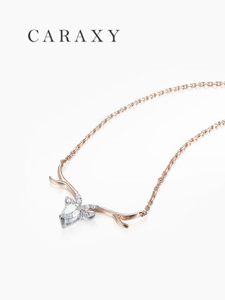 side angle view of antler diamond necklace in rose gold chain