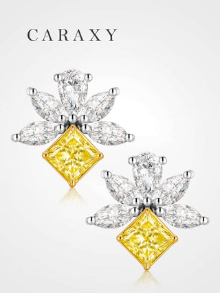 Bee-inspired floral diamond stud earrings with a yellow center stone and white petal-shaped diamonds.