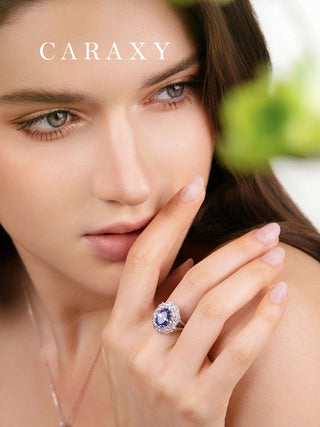 Model wearing blue sapphire cocktail ring.
