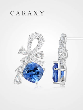 Bluebell-inspired sapphire drop earrings with cushion blue sapphires.