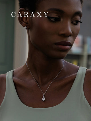 Boxing glove pendant necklace for women in sterling silver, designed as meaningful sports jewelry.