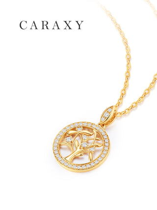Close-up of a Tree of Life pendant with a bright-cut pavé halo and accented bail