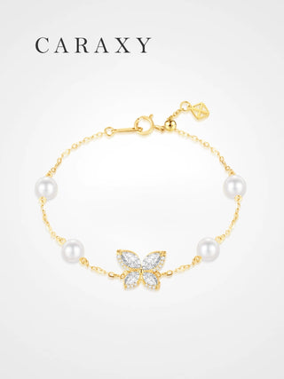 18K yellow gold butterfly bracelet with marquise lab-grown diamonds and four freshwater pearls