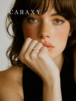 Model wearing a vine-inspired lab-grown diamond wave ring