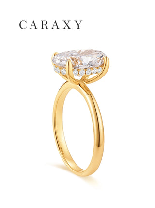 CARAXY oval cut engagement ring in yellow gold with a hidden halo, side profile view