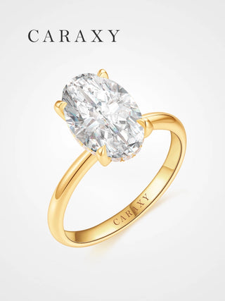 Oval lab-grown diamond hidden halo engagement ring in 18K yellow gold
