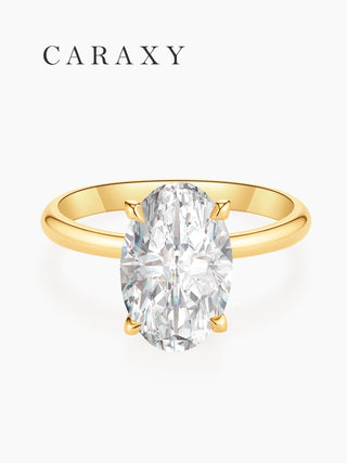 Top view of an oval-cut lab-grown diamond solitaire ring in yellow gold