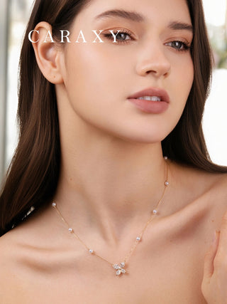 caraxy-yellow-gold-butterfly-pearl-necklace-lifestyl
