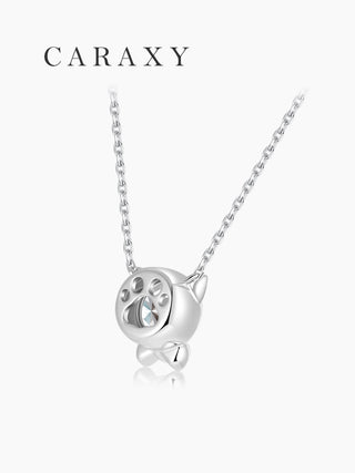 Back view of cat diamond necklace with open paw design allowing light through the diamond.