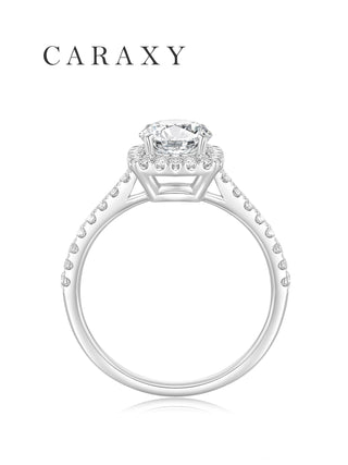 Side view of a cathedral halo ring showcasing the elegant arched setting and pavé details.