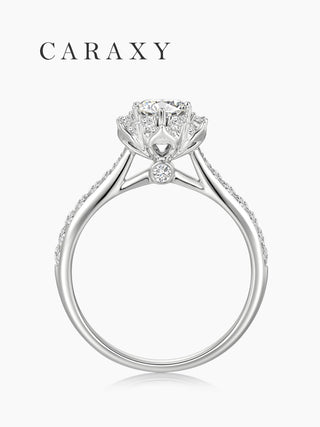 Side view of a cathedral setting ring highlighting the hidden surprise diamond detail.