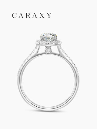 Side view of a cathedral setting halo ring showcasing the hidden surprise diamond.