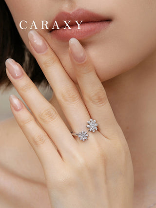 Diamond double flower wrap ring worn on hand, featuring lab grown diamonds and a romantic floral design.