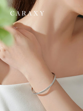 Elegant lab grown diamond half bangle bracelet worn on the wrist for a timeless daily fine jewelry look.