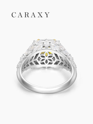 Top view of a fancy yellow diamond ring with double halo and marquise diamond accents.