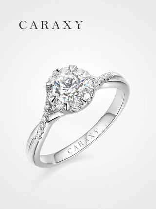 A stunning floral engagement ring with a cluster diamond setting and pavé band.