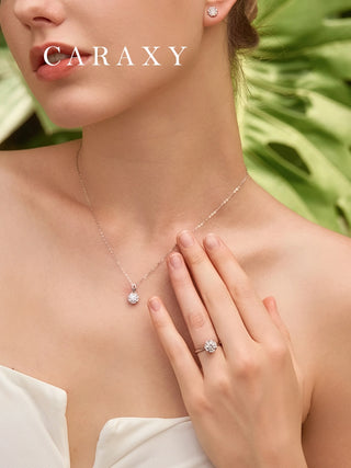 floral halo engagement ring paired with matching necklace and earrings set