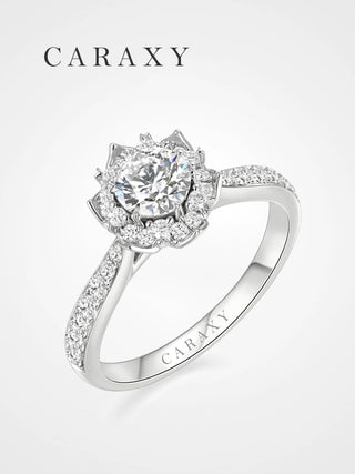 A stunning floral halo lab-grown diamond engagement ring with a pavé band.