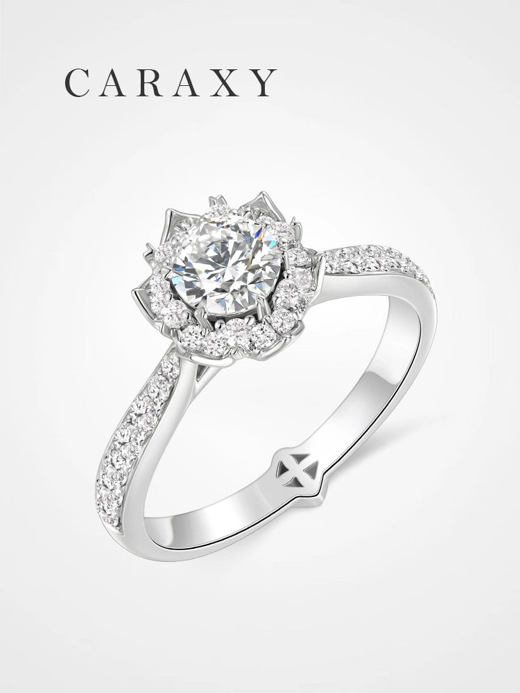 A stunning floral halo lab-grown diamond engagement ring with a pavé band.