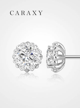 Floral halo lab grown diamond stud earrings with round center diamonds and petal-like accents.