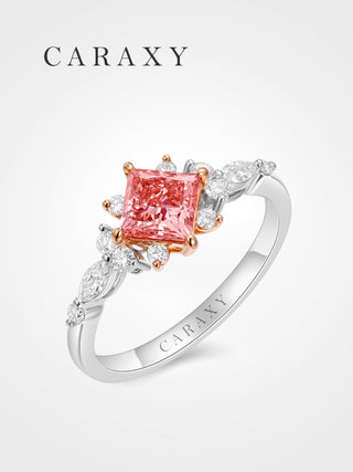 Floral princess cut pink diamond side stone engagement ring from CARAXY.