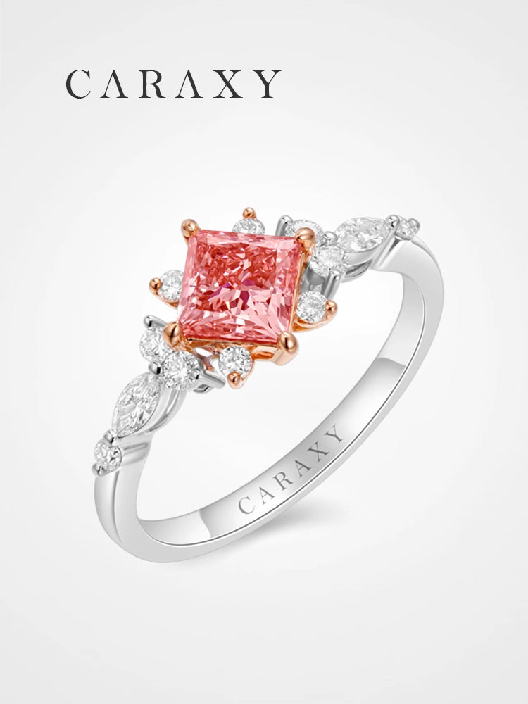 Floral princess cut pink diamond side stone engagement ring from CARAXY.