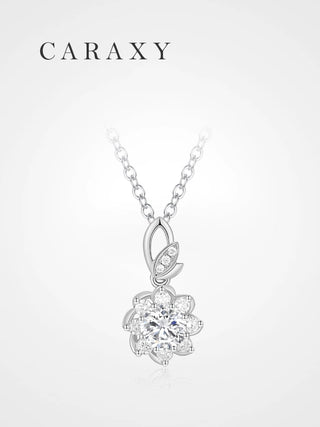 Lab grown diamond flower pendant necklace in 18K white gold with a round center stone and floral halo, front view.