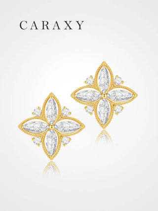 Four-petal floral lab grown diamond stud earrings in 18K yellow gold with marquise diamonds.