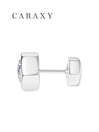 Side view of geometric diamond stud earrings with a polished 18K white gold setting.