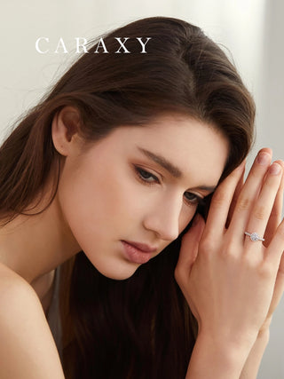 Lifestyle view of a model wearing a brilliant halo engagement ring with hidden details.