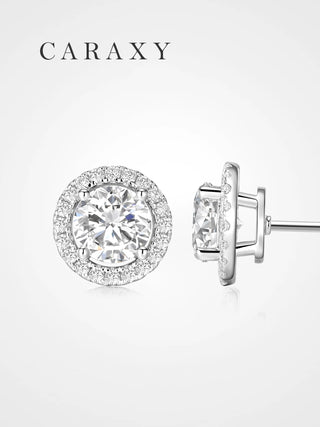Halo stud earrings featuring round lab-grown diamonds surrounded by pavé diamond halos in 18K white gold.