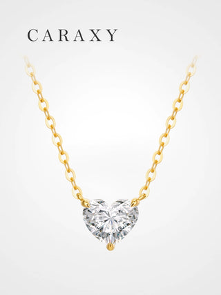 caraxy heart-cut diamond pendant in 18k gold on white background