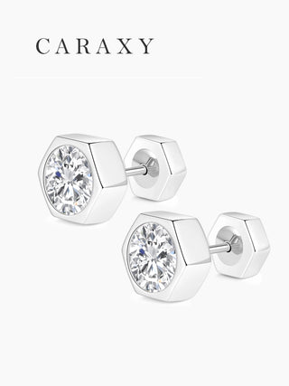 Angled view of hexagon diamond studs with round brilliant center stones.
