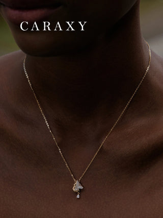 Model wearing horse-inspired lab grown diamond necklace in 18K yellow gold.