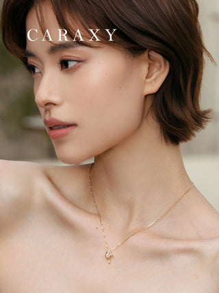 Horse lovers diamond pendant necklace styled on model with elegant jewelry look.